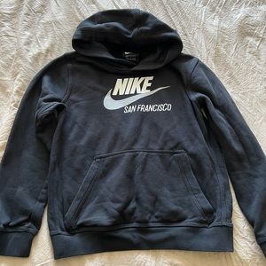 Kids Nike black sweater size Medium.